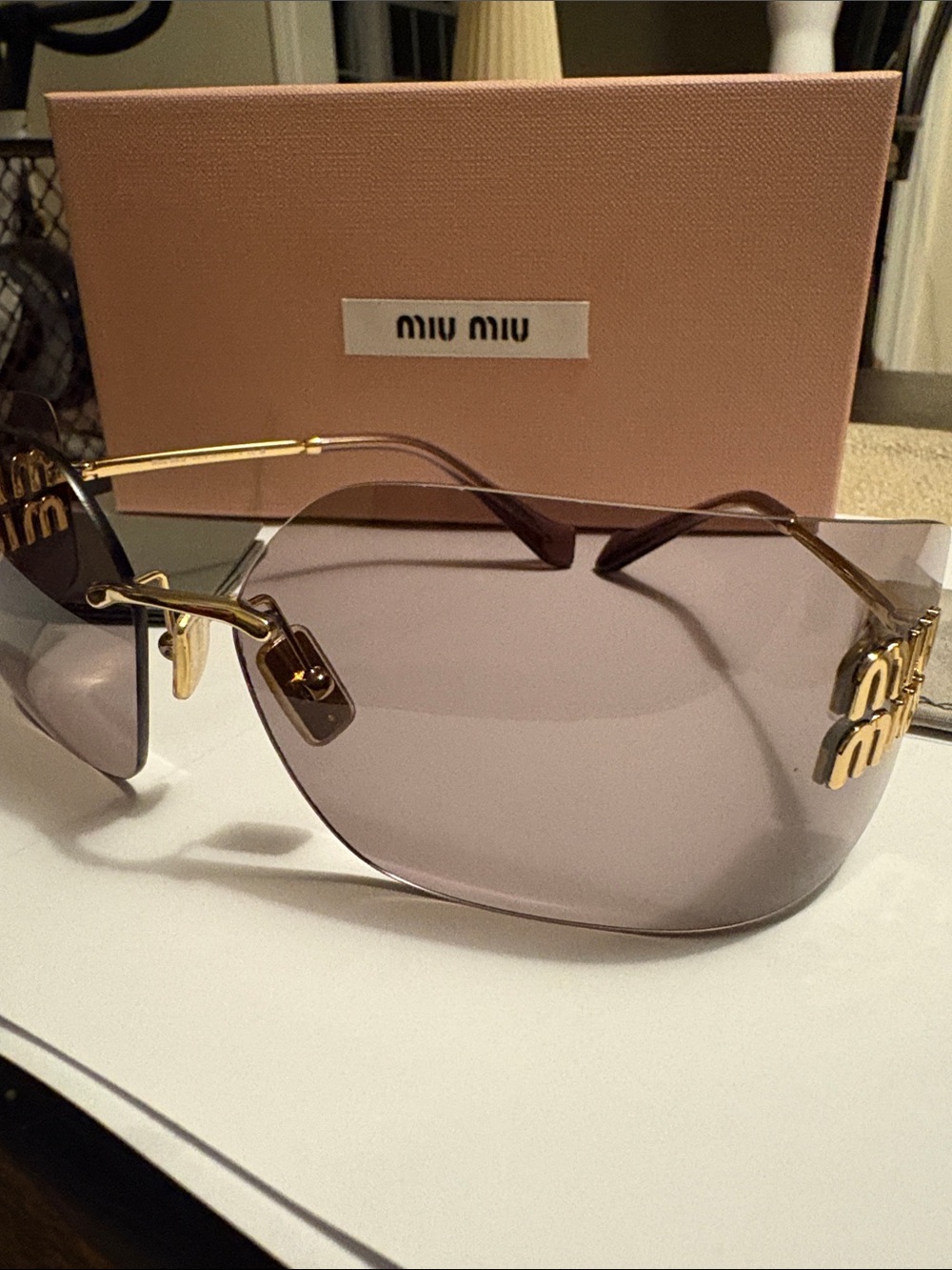 Miu Miu 54YS Sunglasses
Gold - Light Purple Brown